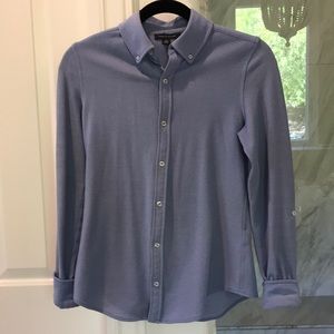 Long sleeve button down shirt.